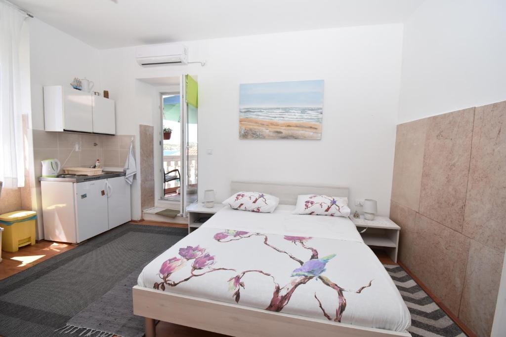 Кровать или кровати в номере Apartmani Rina