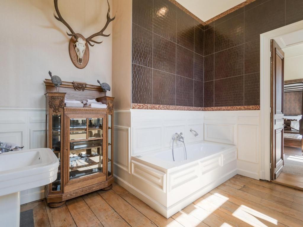Postel nebo postele na pokoji v ubytování Hotel Dufays