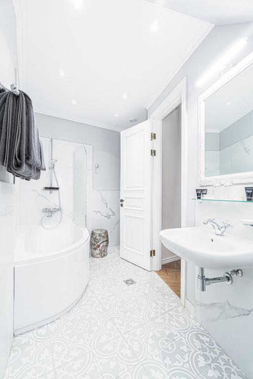 Koupelna v ubytování Forums Boutique Hotel