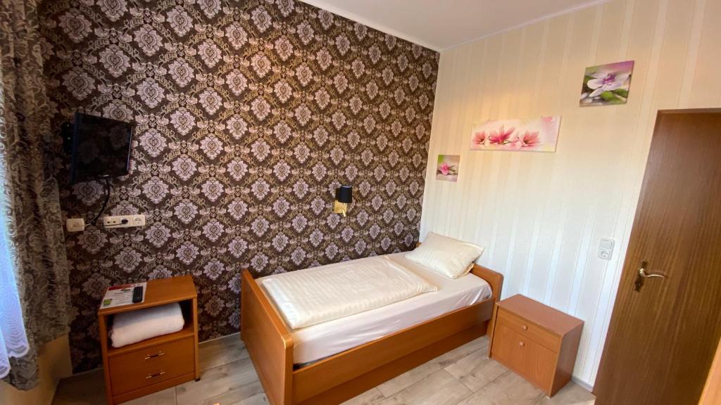 Postel nebo postele na pokoji v ubytování Schröder's Motel