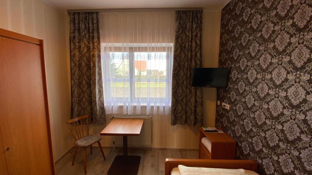 TV a/nebo společenská místnost v ubytování Schröder's Motel