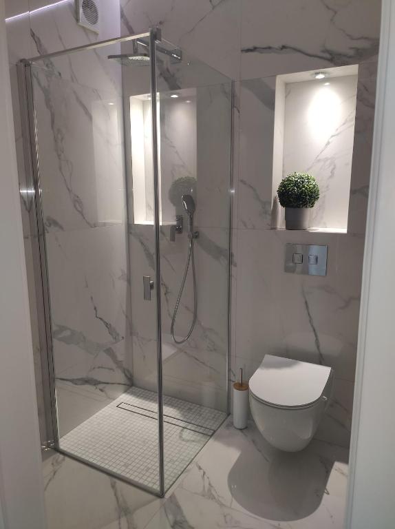 Kúpeľňa v ubytovaní Masuria Apartaments Ełk Nadjeziorna