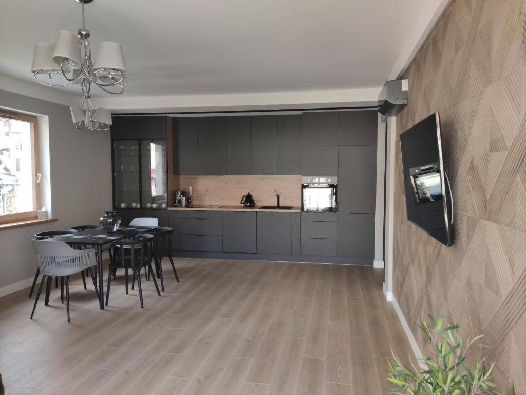Kuchyňa alebo kuchynka v ubytovaní Masuria Apartaments Ełk Nadjeziorna