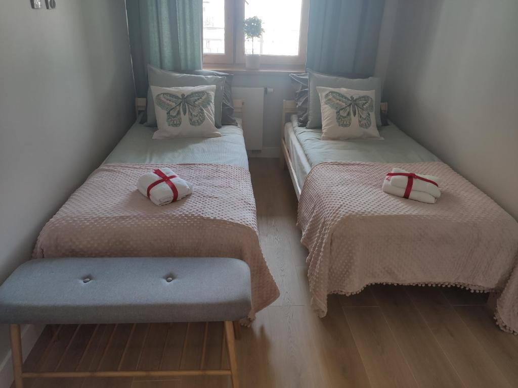 Posteľ alebo postele v izbe v ubytovaní Masuria Apartaments Ełk Nadjeziorna