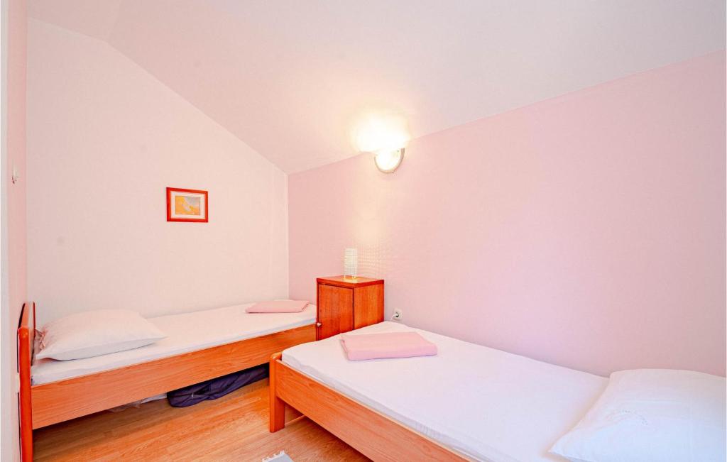 Posteľ alebo postele v izbe v ubytovaní Holiday Home Ston 1