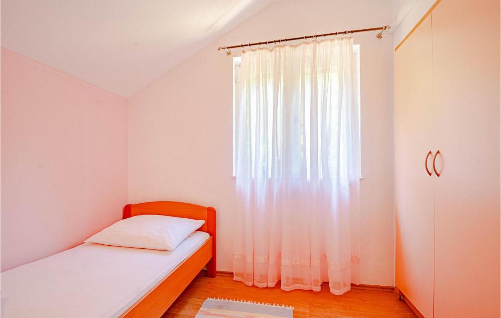 Posteľ alebo postele v izbe v ubytovaní Holiday Home Ston 1