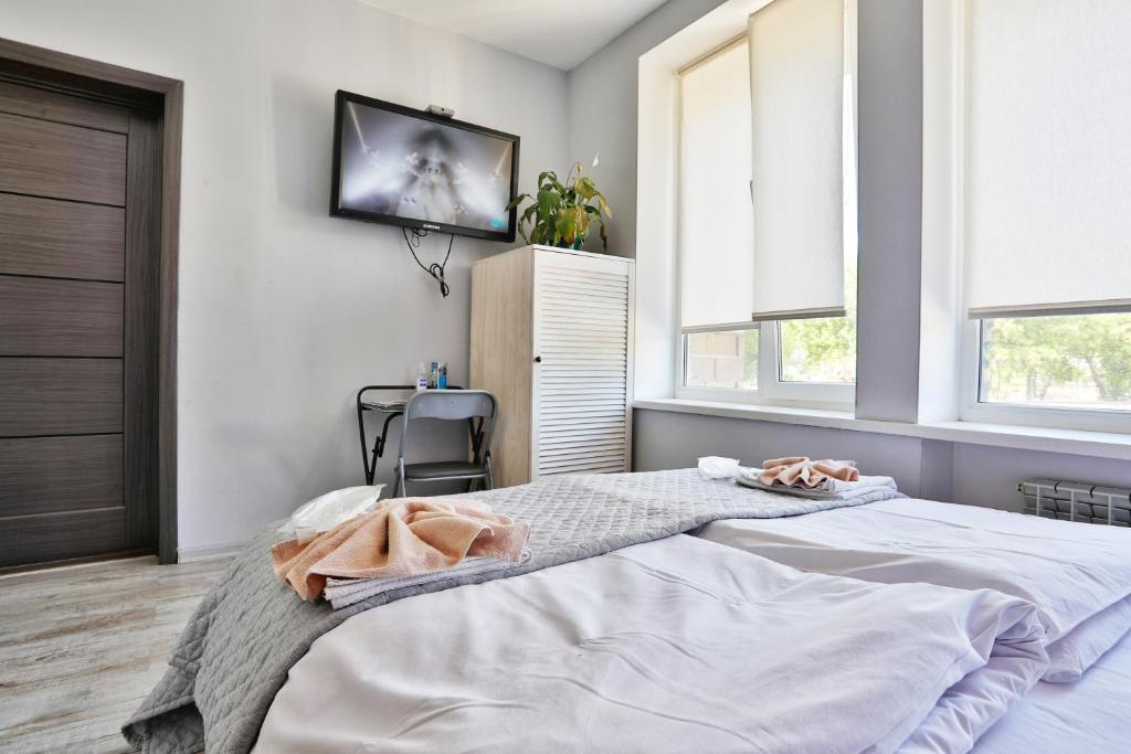 Letto o letti in una camera di Light Life Hostel