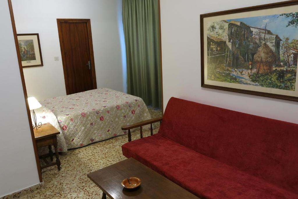 Postel nebo postele na pokoji v ubytování Hotel Andalucía