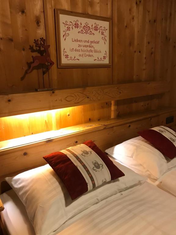 Postel nebo postele na pokoji v ubytování Das Enzian
