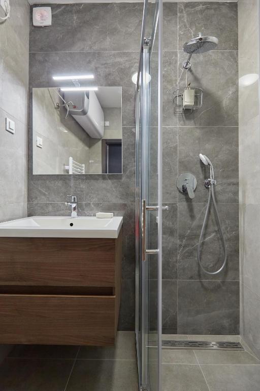 Kúpeľňa v ubytovaní Apartments Kolorina