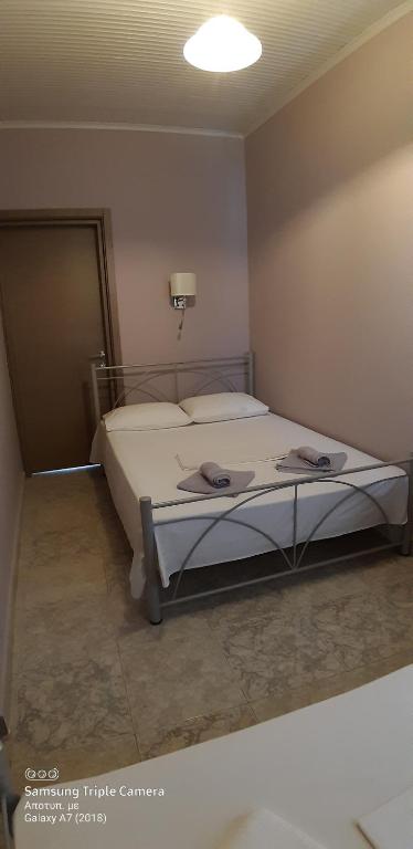 Postel nebo postele na pokoji v ubytování SEA VIEW APARTMENTS Zeus