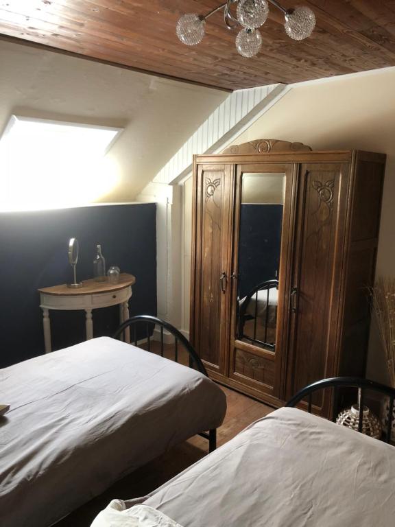 Postel nebo postele na pokoji v ubytování Maison Moulin Bousset