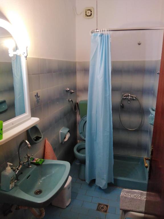 Koupelna v ubytování Ηotel Della