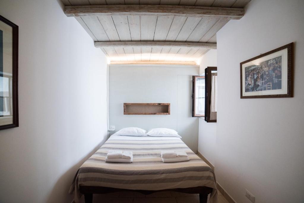 Postel nebo postele na pokoji v ubytování Charming Trulli