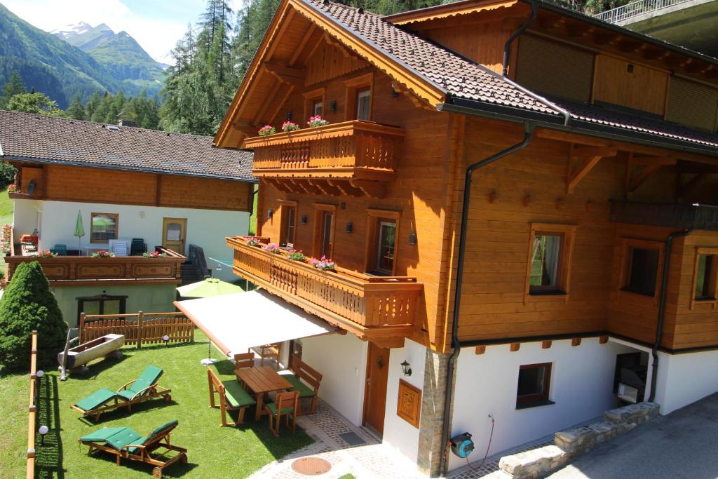 an aerial view of a house with a yard at Zirbenchalet Grossglockner in Heiligenblut