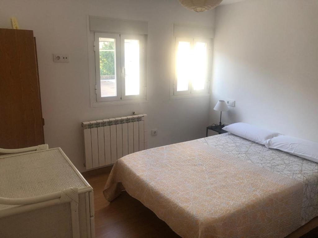 Postel nebo postele na pokoji v ubytování Polvorín