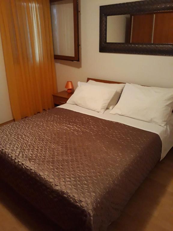 Postel nebo postele na pokoji v ubytování Apartments Anita