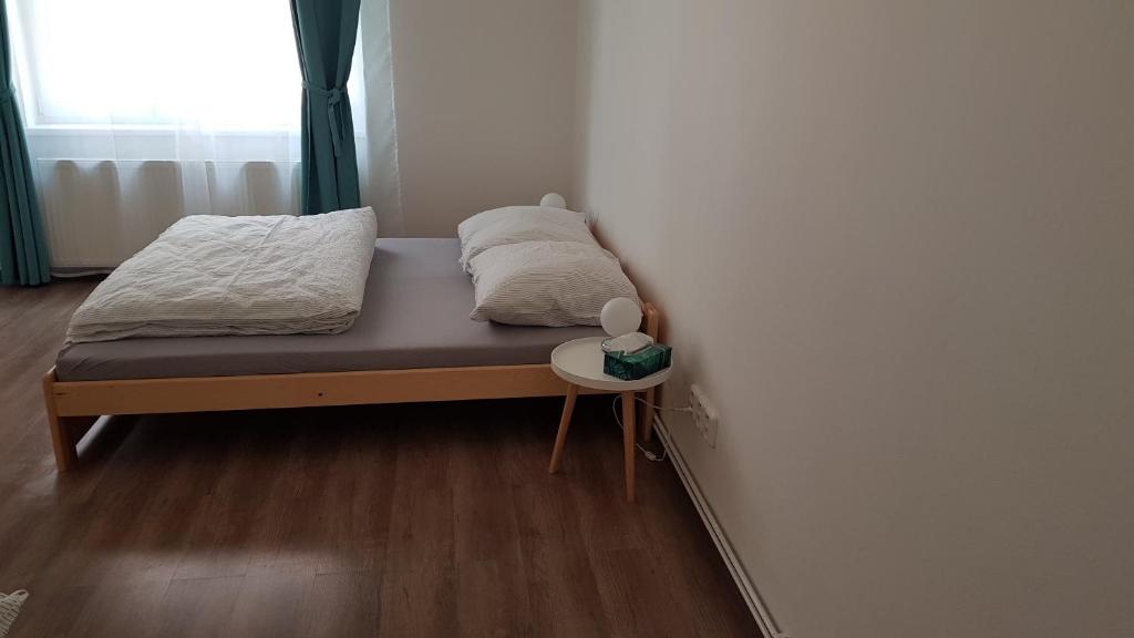 Posteľ alebo postele v izbe v ubytovaní Apartmán Pod Zámkem