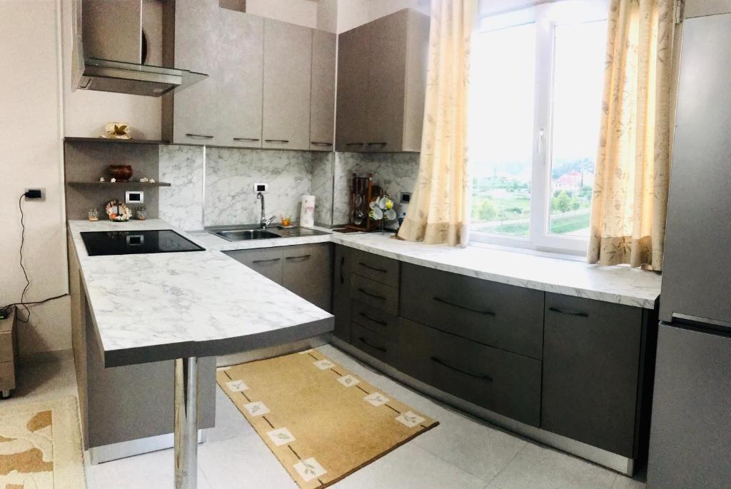 Kuchyň nebo kuchyňský kout v ubytování Cappuccino Apartment