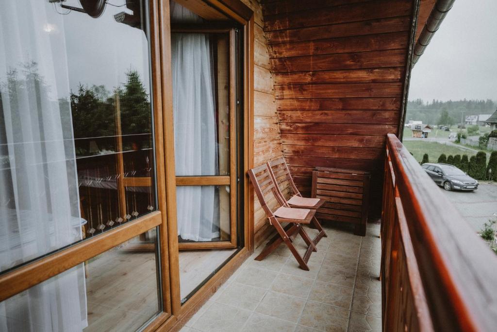 Balkón nebo terasa v ubytování Domki i Pokoje obok Term Chochołów U Tadka