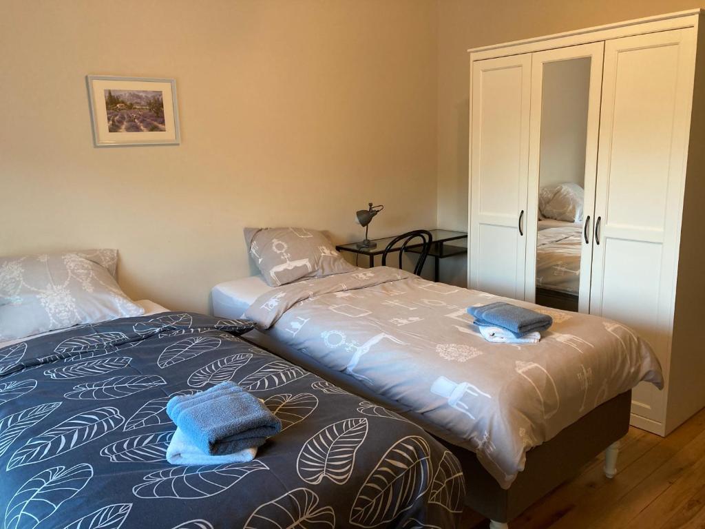 Postel nebo postele na pokoji v ubytování B&B Molen Ter Walle