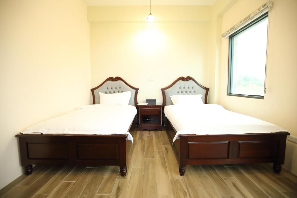 Postel nebo postele na pokoji v ubytování 出門獺踏 Otter footprints B&B