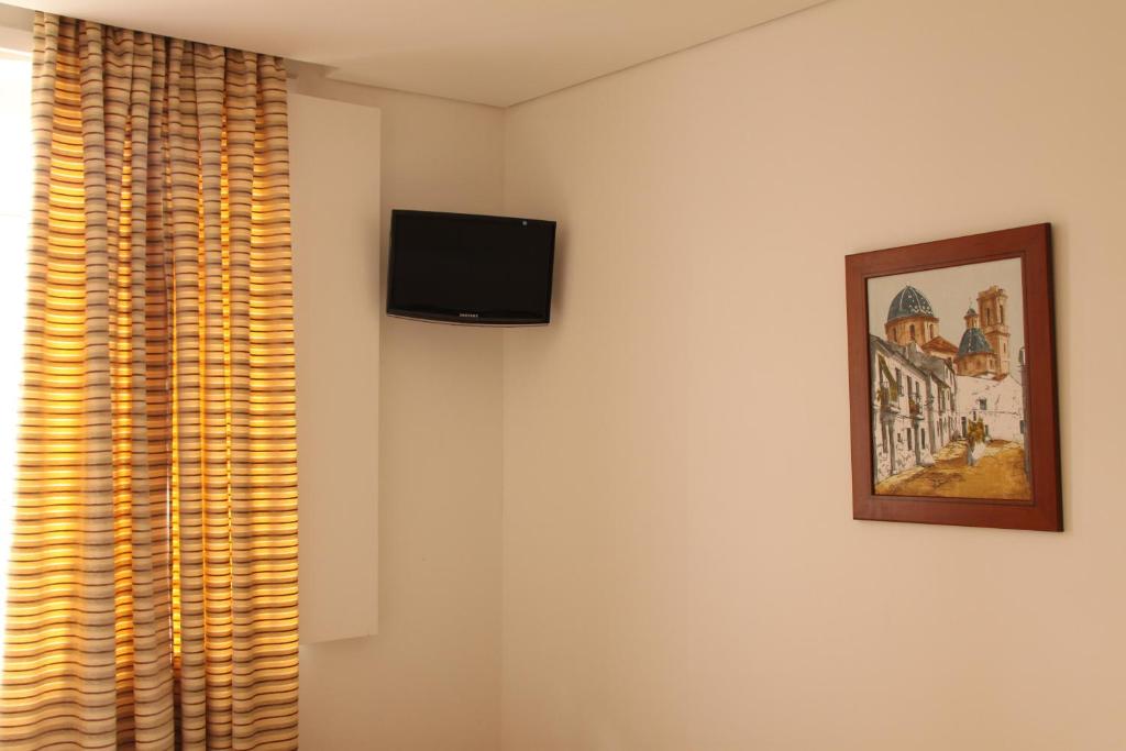 TV a/nebo společenská místnost v ubytování Hotel Zenite