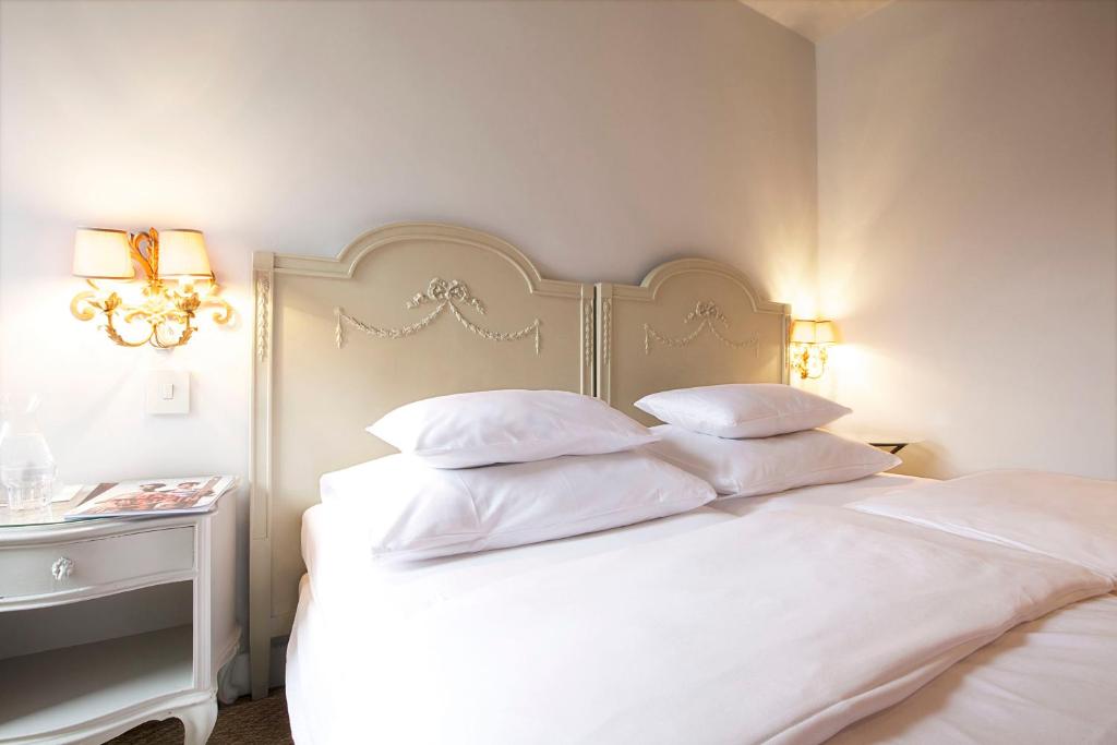 Posteľ alebo postele v izbe v ubytovaní Das REGINA Boutiquehotel