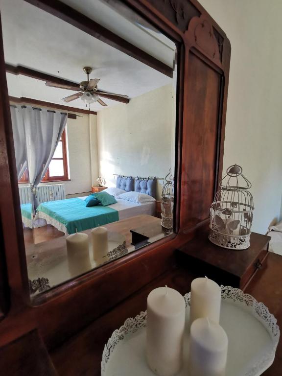 A bed or beds in a room at Agriturismo Mondo
