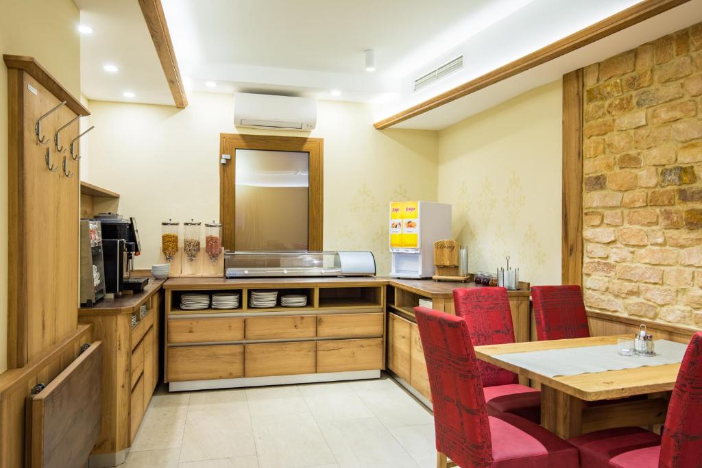 Kuchyň nebo kuchyňský kout v ubytování Hotel Freiensteinerhof Superior