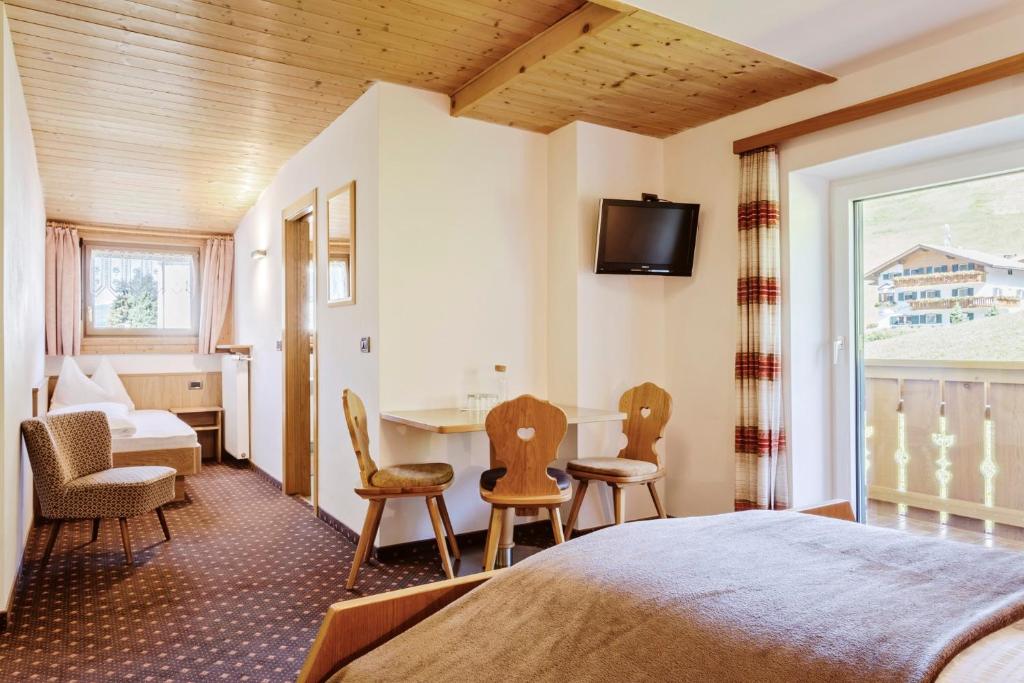Postel nebo postele na pokoji v ubytování Garni Charlotte