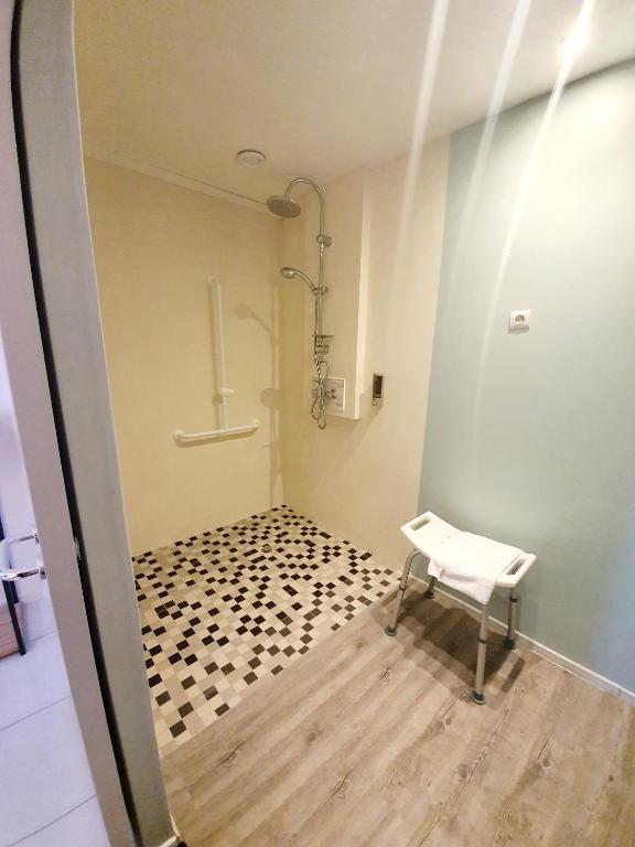 Koupelna v ubytování Hôtel Le Lys