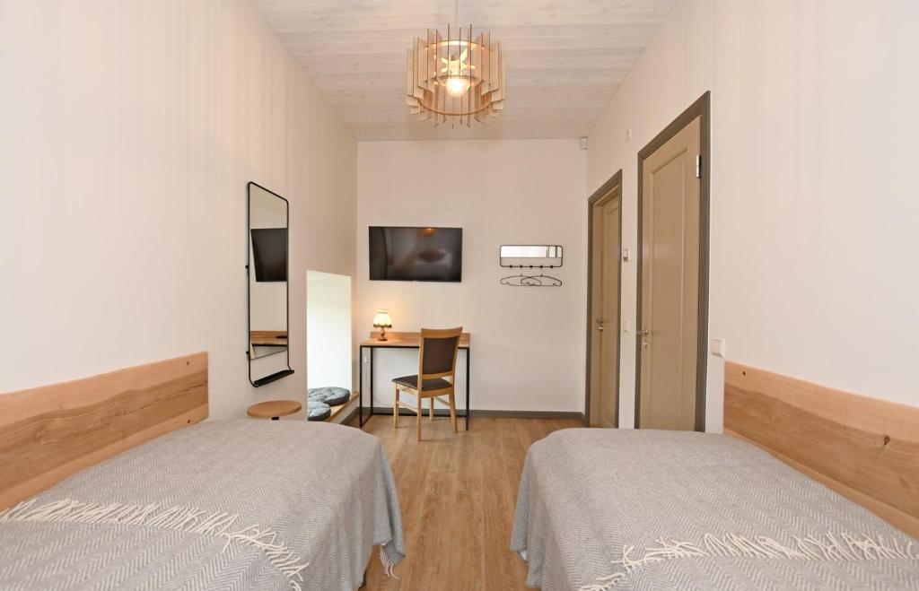 Postel nebo postele na pokoji v ubytování Riverside Villa