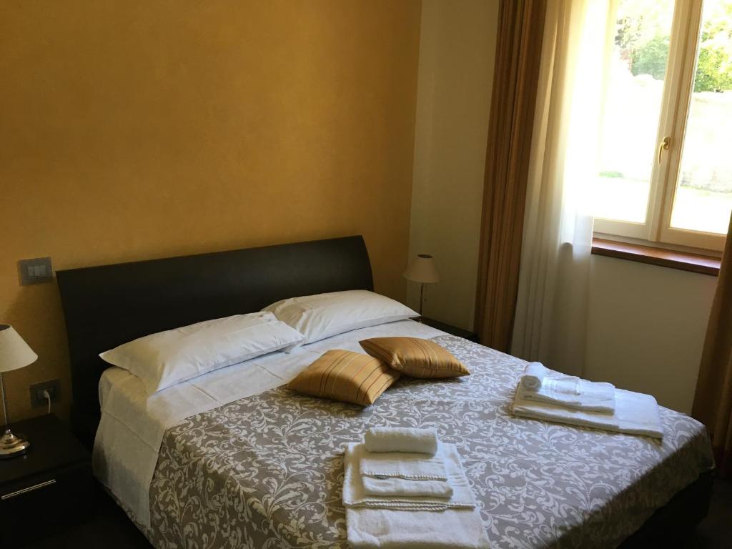 Postel nebo postele na pokoji v ubytování Arc en Ciel Appartments