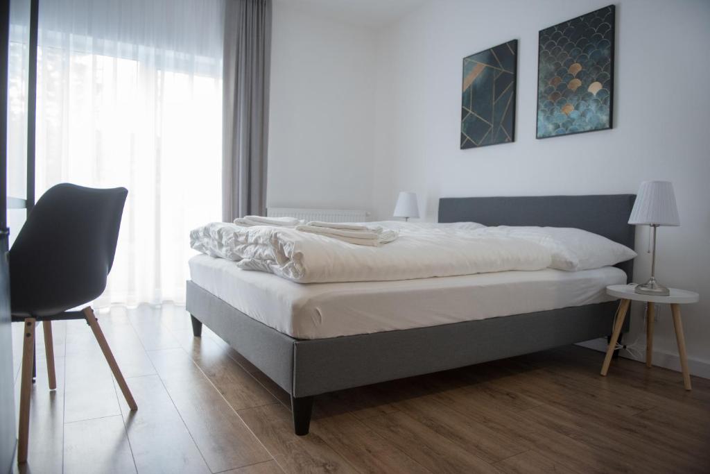 Postel nebo postele na pokoji v ubytování Stará Pošta