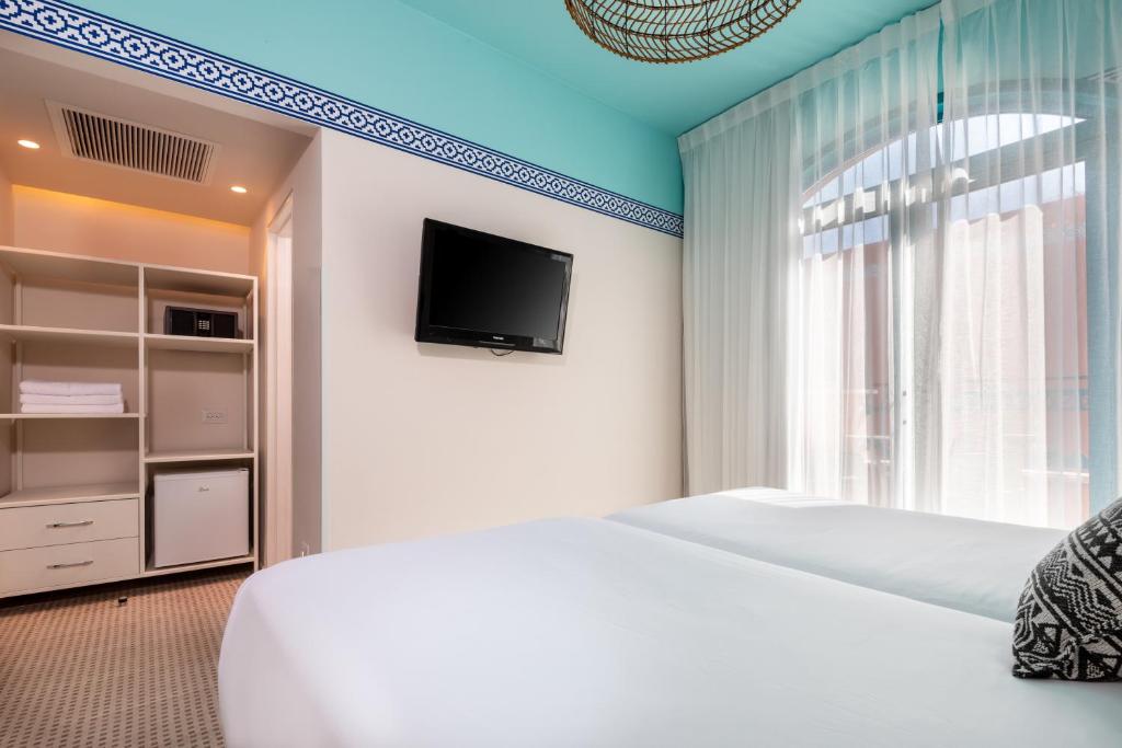 TV&#47;Unterhaltungsangebot in der Unterkunft U Splash Resort Eilat