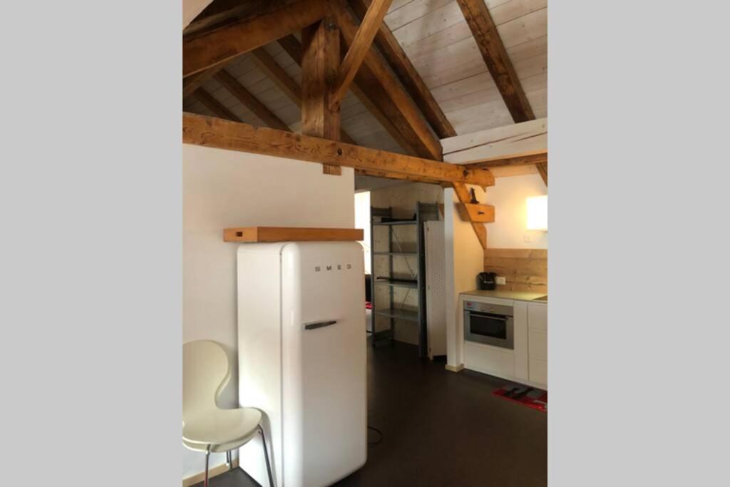 Cucina o angolo cottura di Loft 100m2, im Ökohaus in Susch