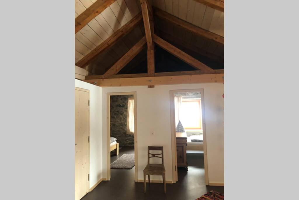 Area soggiorno di Loft 100m2, im Ökohaus in Susch