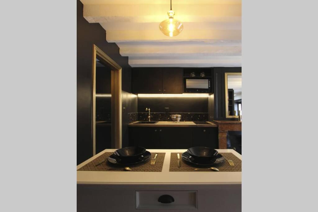 Kuchyň nebo kuchyňský kout v ubytování Le Boudoir