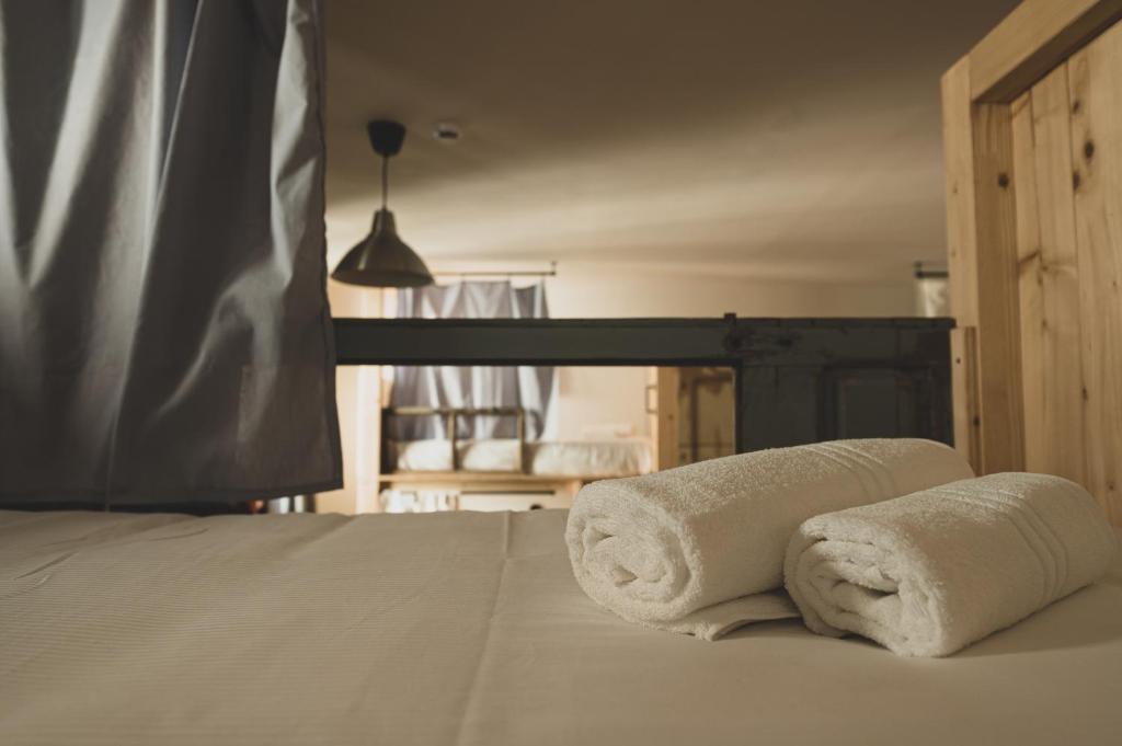 Postel nebo postele na pokoji v ubytování Albergo Diffuso Antagonisti