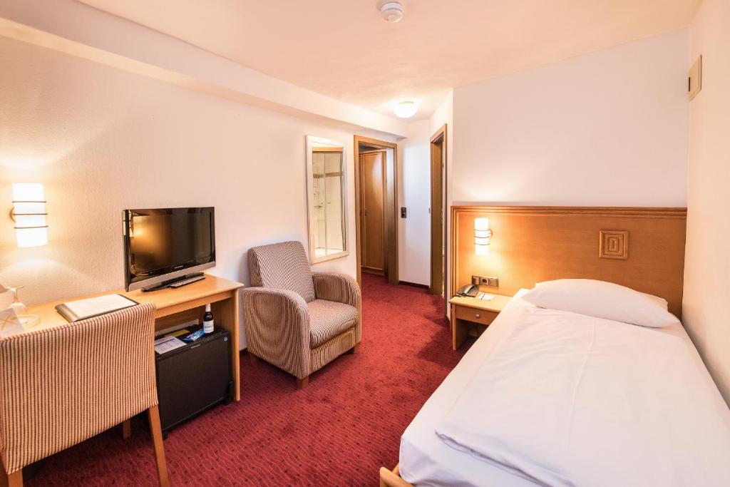 TV a/nebo společenská místnost v ubytování Göbels Hotel zum Löwen