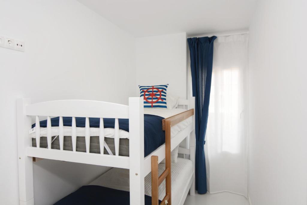 Postel nebo postele na pokoji v ubytování Santa Pola Apartments