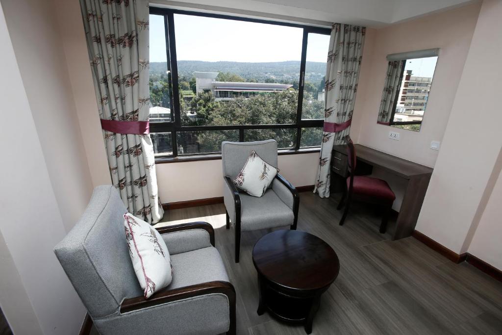 Posezení v ubytování Merica Hotel