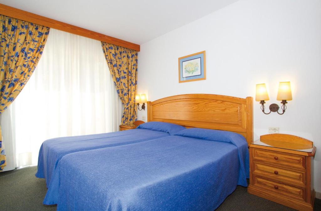 Postel nebo postele na pokoji v ubytování Hotel Riu Oliva Beach Resort - All Inclusive