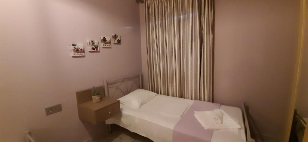 Postel nebo postele na pokoji v ubytování SEA VIEW APARTMENTS Zeus