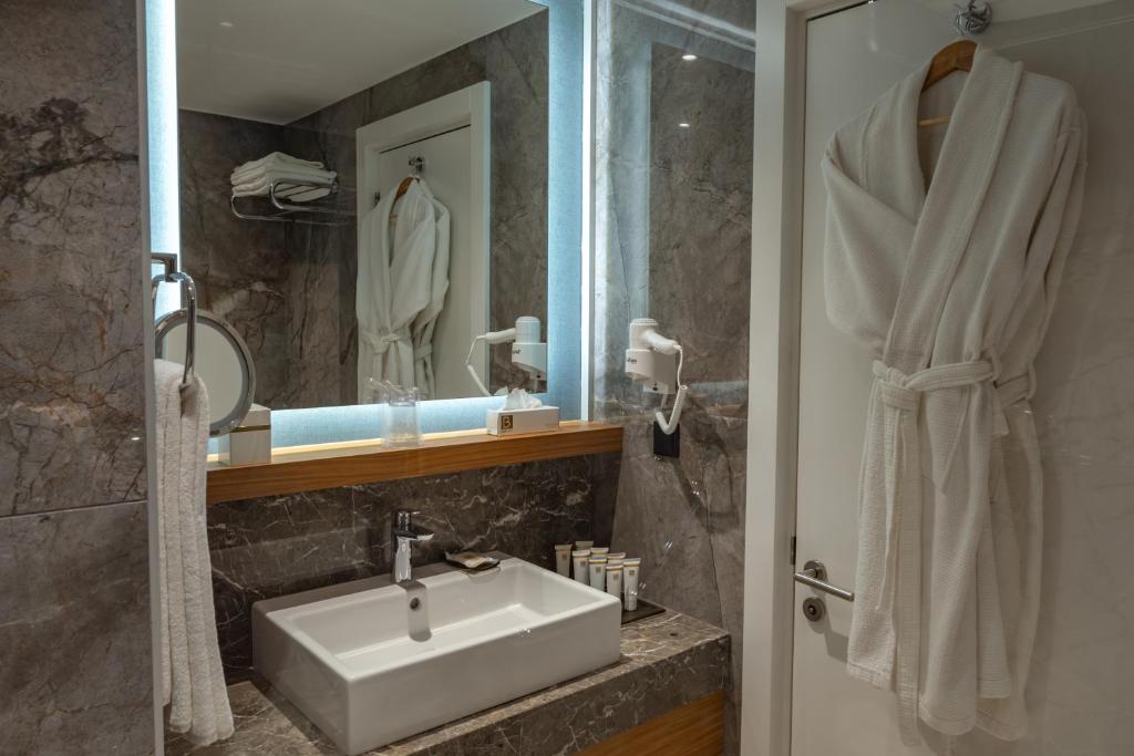 Koupelna v ubytování Baia Lara Hotel