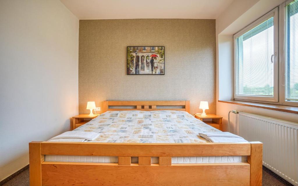 Posteľ alebo postele v izbe v ubytovaní Hotel Dynamic