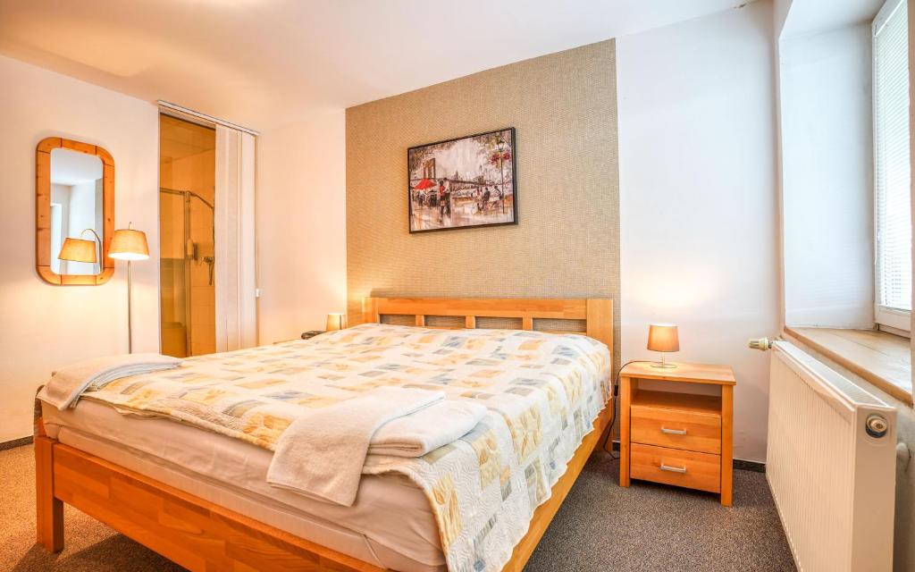 Posteľ alebo postele v izbe v ubytovaní Hotel Dynamic