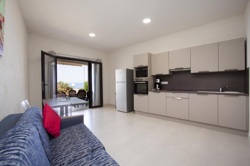 Hôtel et Résidence Ta Kladia - Omigna - Apartamento De Dos Dormitorios