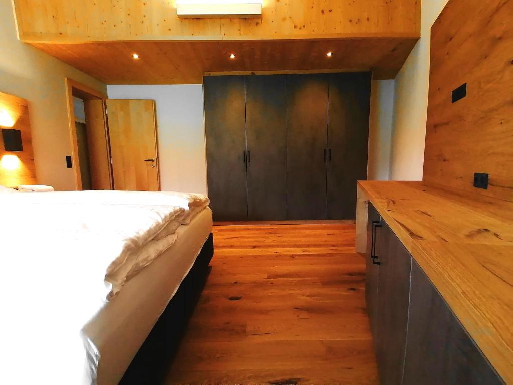 Postel nebo postele na pokoji v ubytování Ferienwohnungen Strass im Zillertal